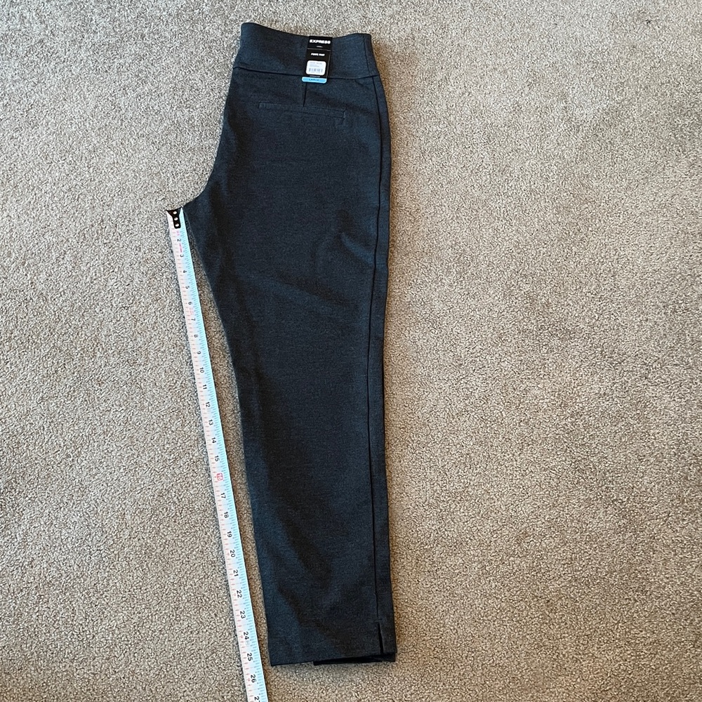 New with tags ladies Express stretch pants size large note color is dark gray